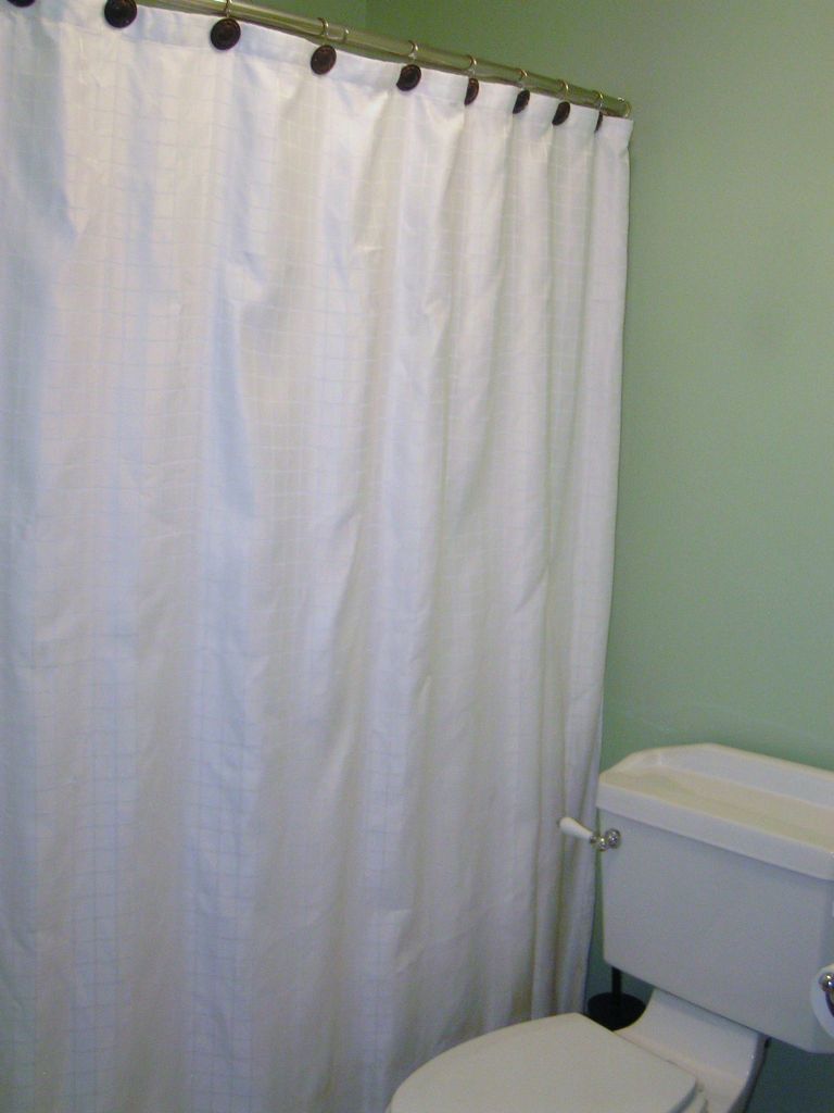 curved shower rod for extra room